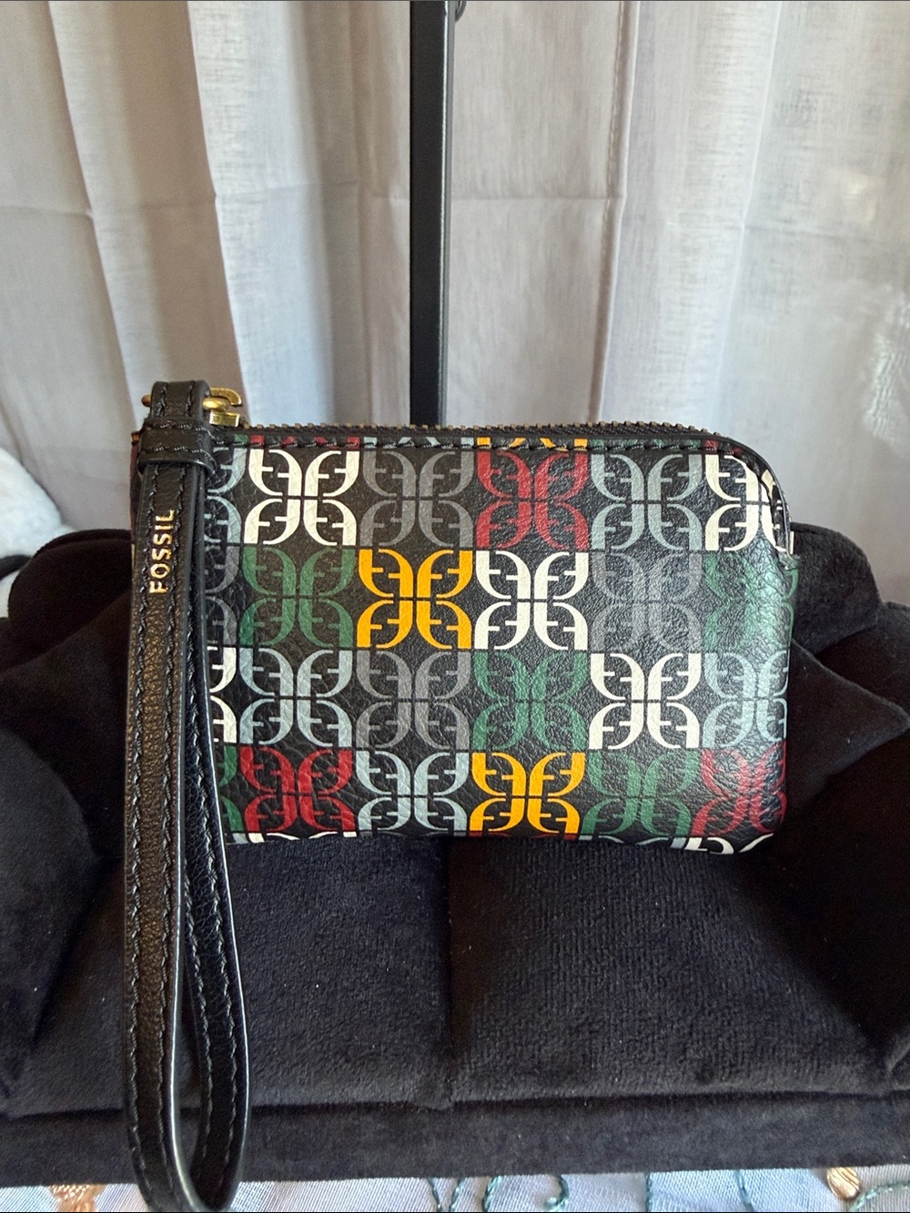 Fossil Black Wristlet with Multicolor Logo Print (Green, Red, Yellow, White)